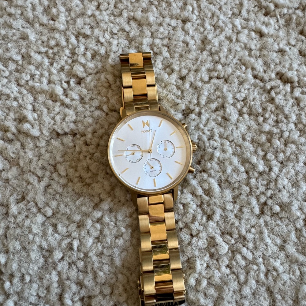 Gold MVMT watch